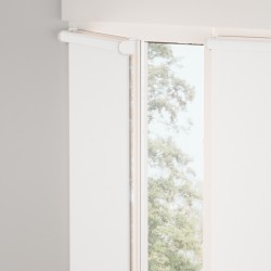 Fabric roller with blackout fabric on the window Fabric roller with blackout fabric on the window